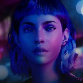 Girl face in front of purple and blue background